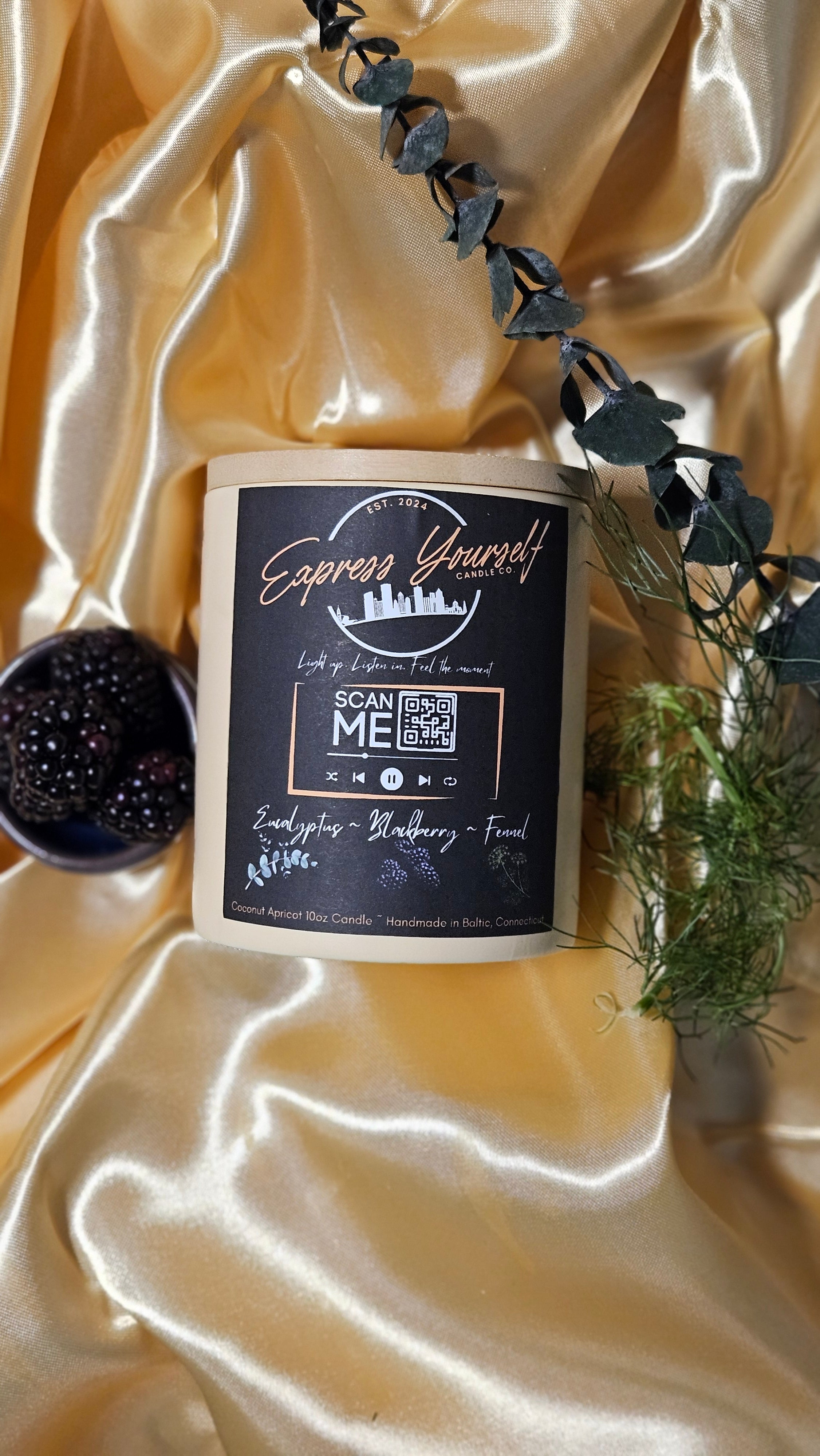 Handmade Eucalyptus, Blackberry, and fennel luxury coconut apricot wax candle with QR code.