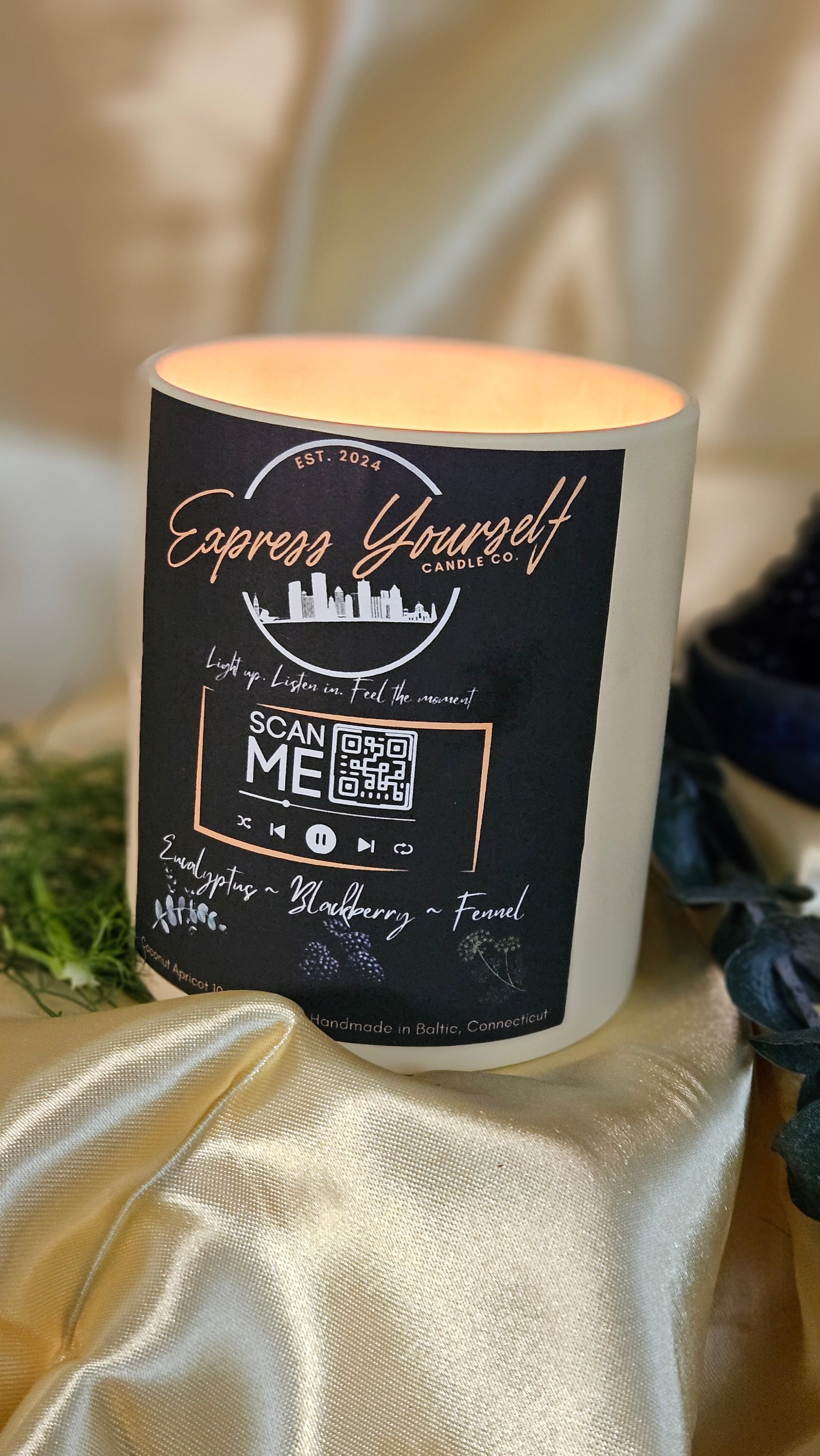 Handmade Eucalyptus, Blackberry, and fennel luxury coconut apricot wax candle with QR code.