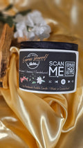 Mini Messenger personalized honeysuckle jasmine luxury candle with QR code audio experience on gold satin background.