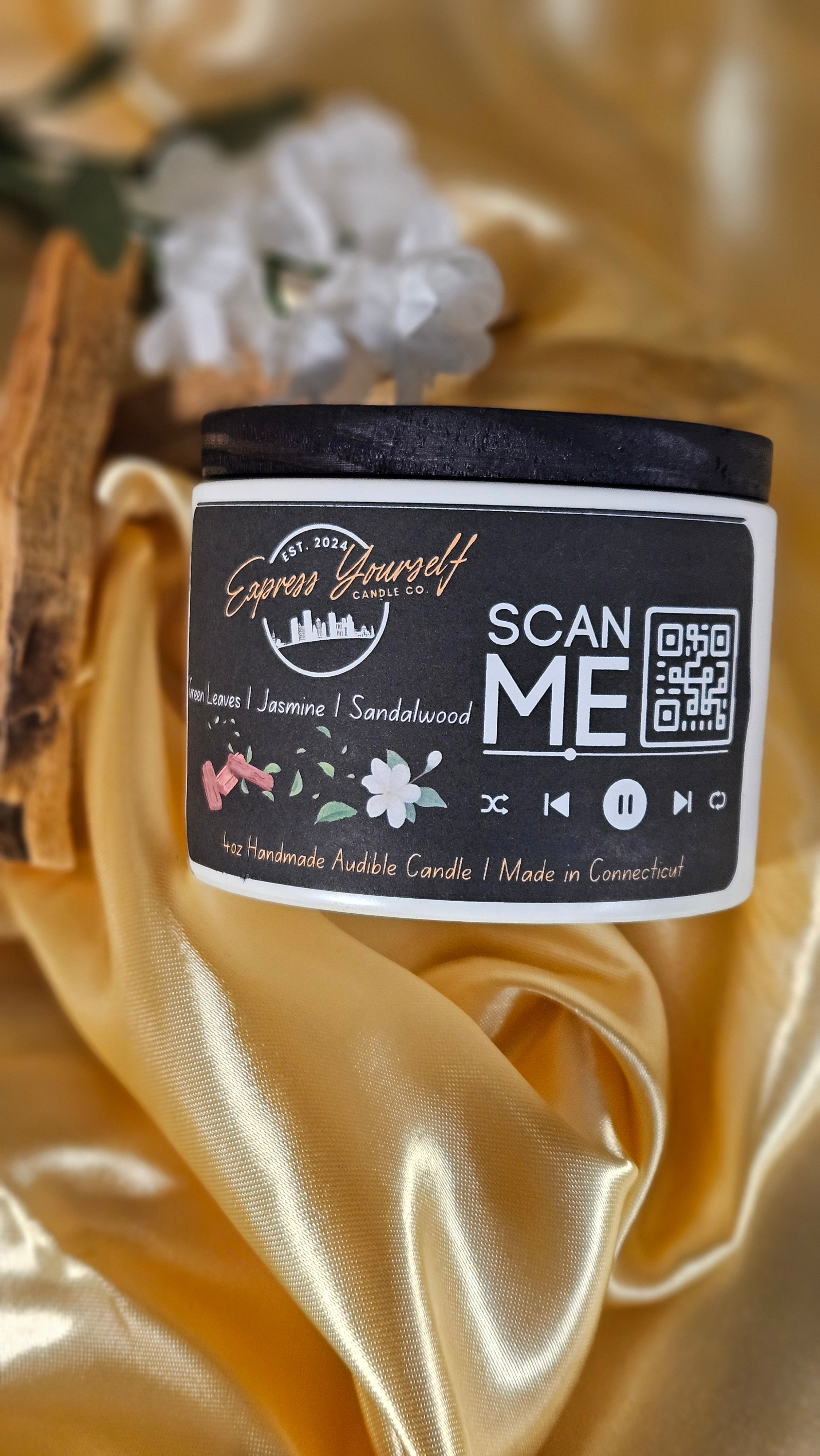 Mini Messenger personalized honeysuckle jasmine luxury candle with QR code audio experience on gold satin background.