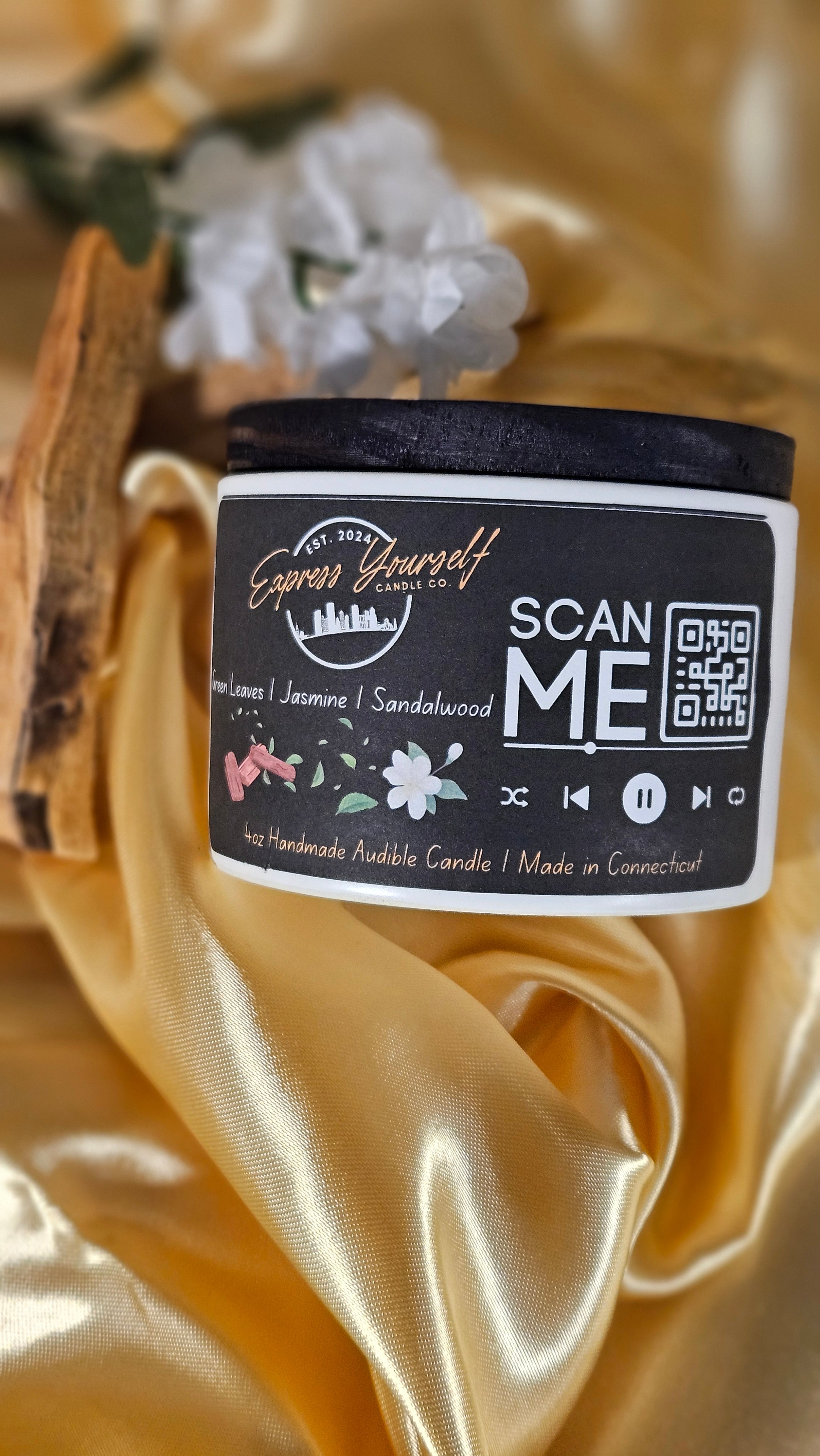 Mini Messenger personalized honeysuckle jasmine luxury candle with QR code audio experience on gold satin background.