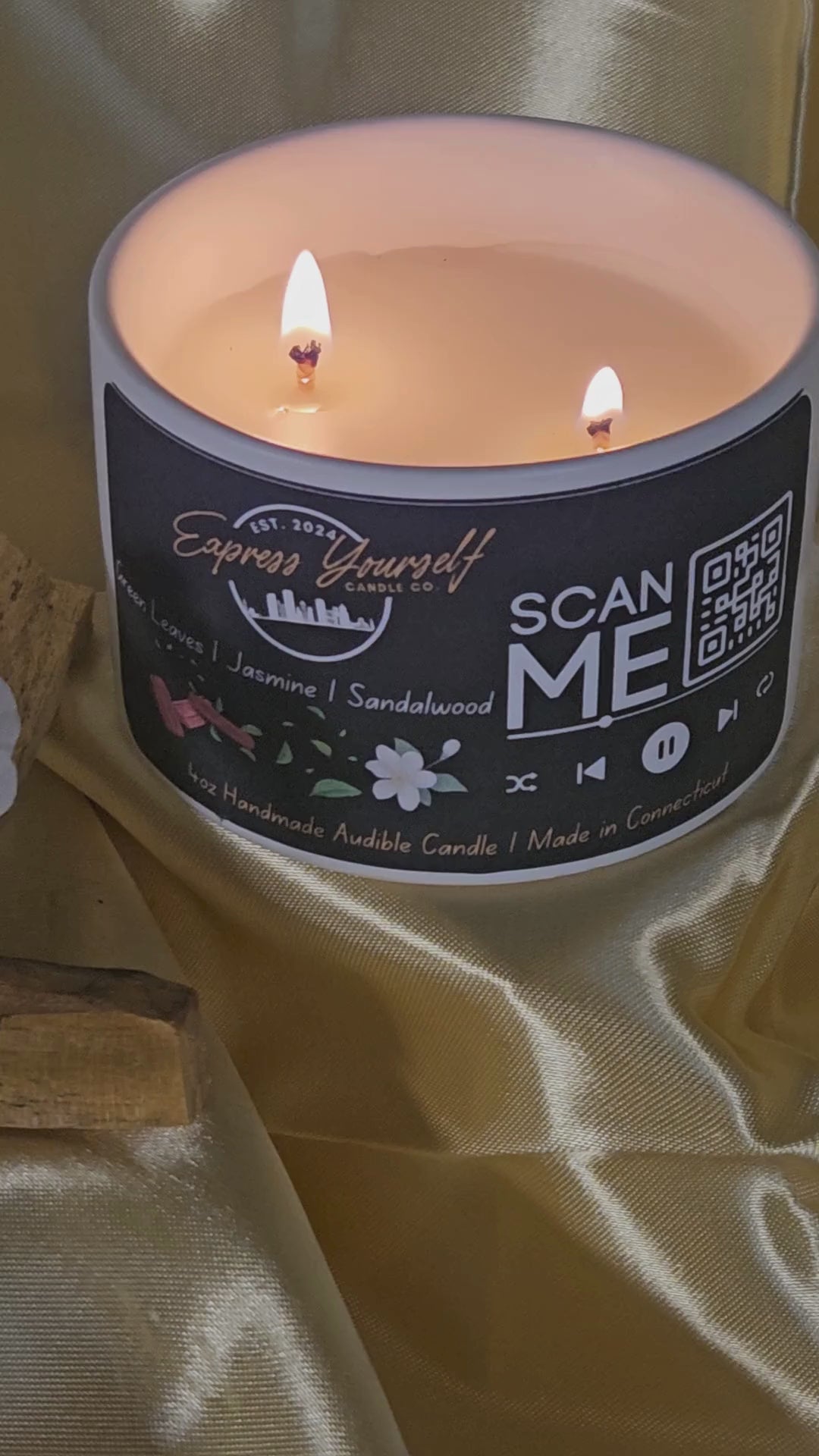 Mini Messenger personalized honeysuckle jasmine luxury candle with QR code audio experience on gold satin background.
